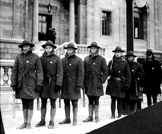 Black and white photograph of Home Guardsmen on duty outside the St. Paul Public Library during the Street Railway union rally in Rice Park, December 2, 1917.