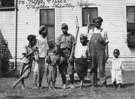 Black and white photograph of children at the Phyllis Wheatley House, 1925.