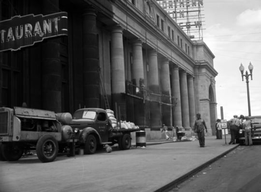 Black and white photograph of Workmen cleaning Minneapolis Great Northern Depot, 1944.