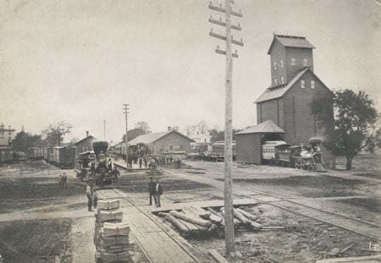 Black and white photograph of the St. Paul and Pacific Railroad depot, Washington Avenue and North Fourth Avenue, Minneapolis, 1874.