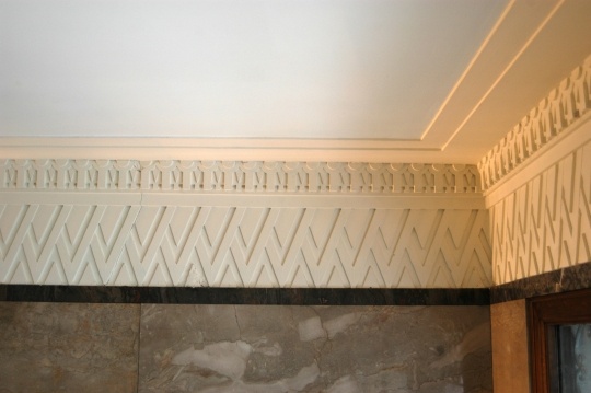 Color image of zig-zag plastered crown molding inside the Minnesota Building, 2009.