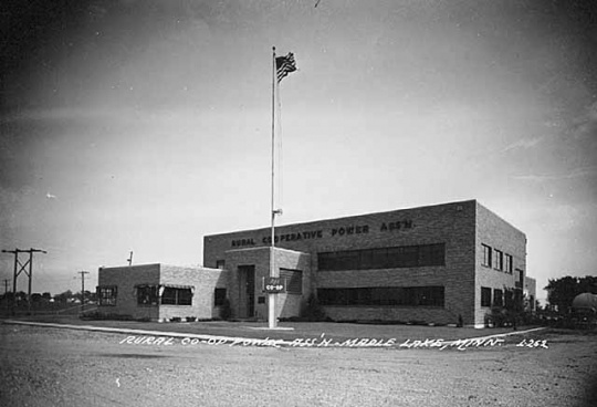 Black and white photograph of the Rural Cooperative Power Association, Maple Lake, ca. 1950.