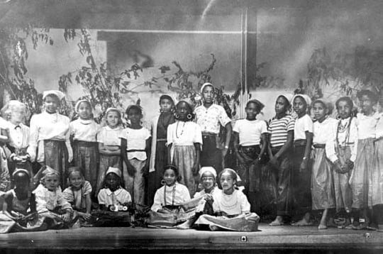 Black and white photograph of a children's theater group at the Phyllis Wheatley House, ca. 1960.