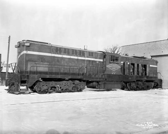 Black and white photograph of a Minneapolis, Northfield and Southern Railway locomotive 22, 1962.