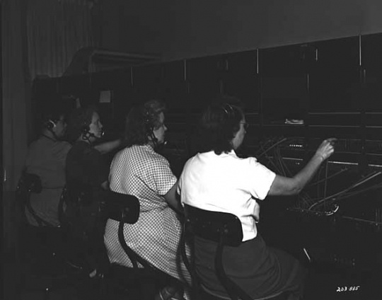 Black and white photograph of a switchboard at L. S. Donaldson Company, 1951. Photograph by Norton & Peel.