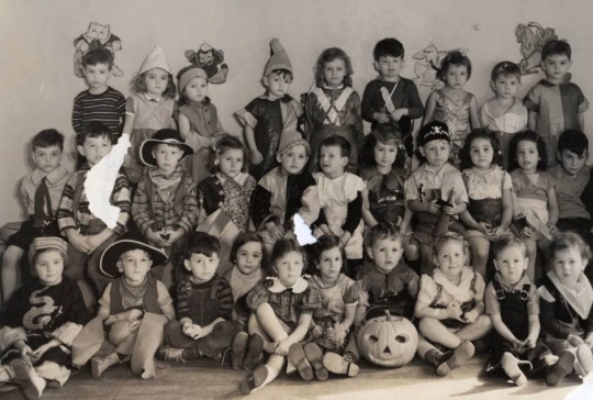Black and white photograph of a Halloween party for the pre-kindergarten class at the Jewish Educational Center in St. Paul, 1937.