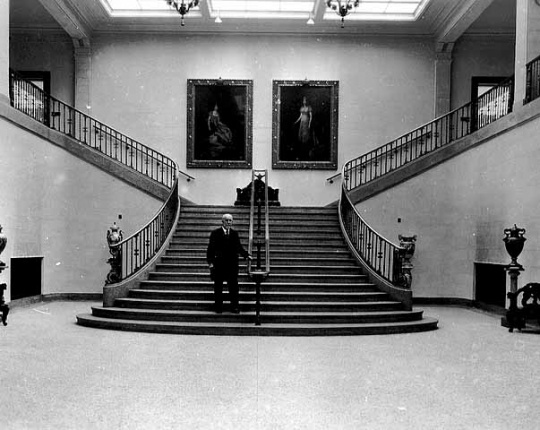 T. B. Walker standing on Grand Stairway