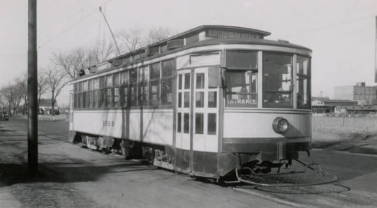 Black and white photograph of a streetcar at Rondo Avenue and Griggs Street, 1947.