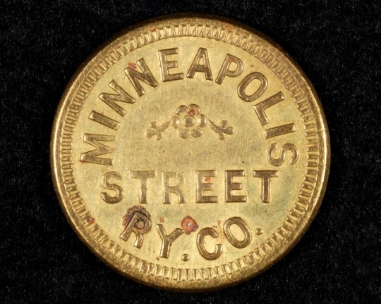 Color image of a Minneapolis Street Railway Company fare token (front), c.1905.