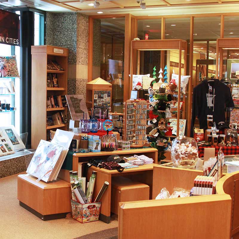 Posters, t-shirts, keychains, and gifts on display in the Minnesota History Center gift shop. Posters, t-shirts, keychains, and gifts on display in the Minnesota History Center gift shop.