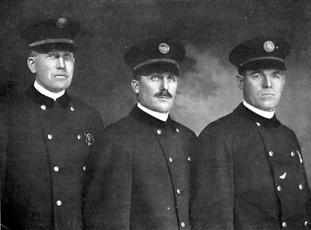 Duluth policemen, group photo.  Edward H. Barber, Police Lieutenant, at far right.