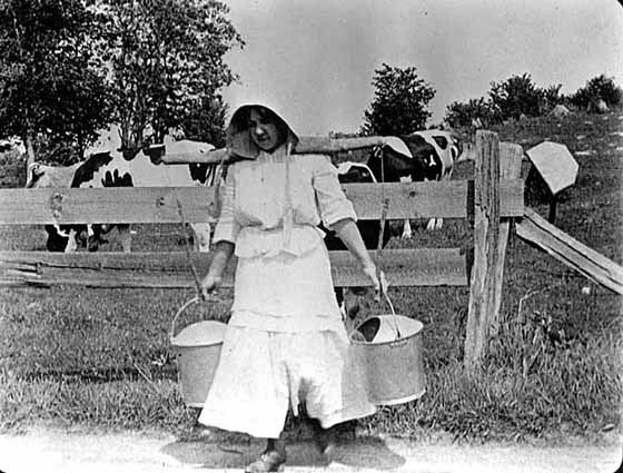 woman-carrying-milk