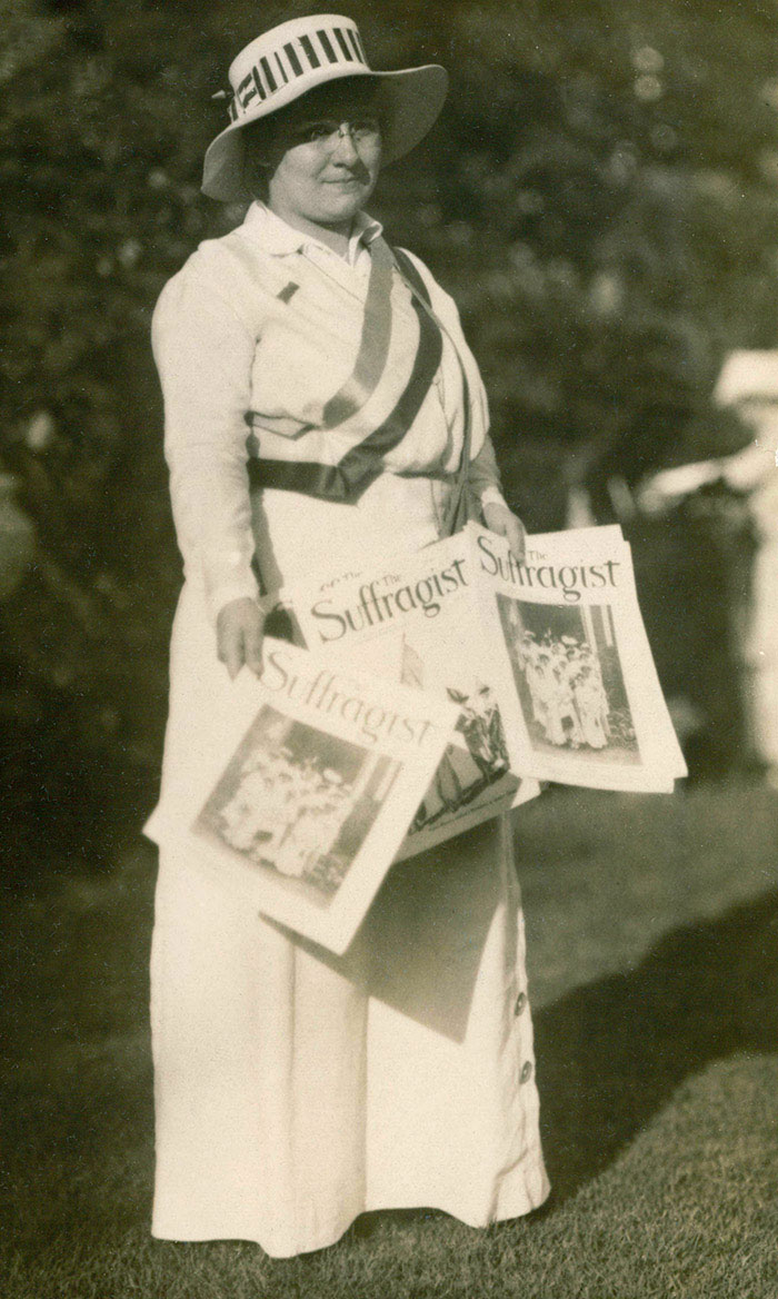 Gertrude Hunter distributing The Suffragist magazine, about 1916.