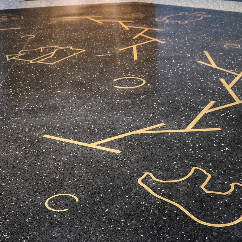 Objects and shapes found in the marble floor of the rotunda.