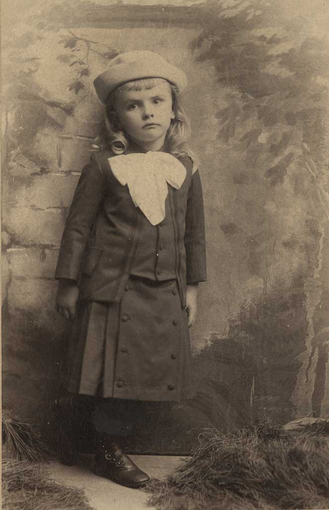 Portrait of Walter as a young boy in a Little Lord Fauntleroy-style outfit