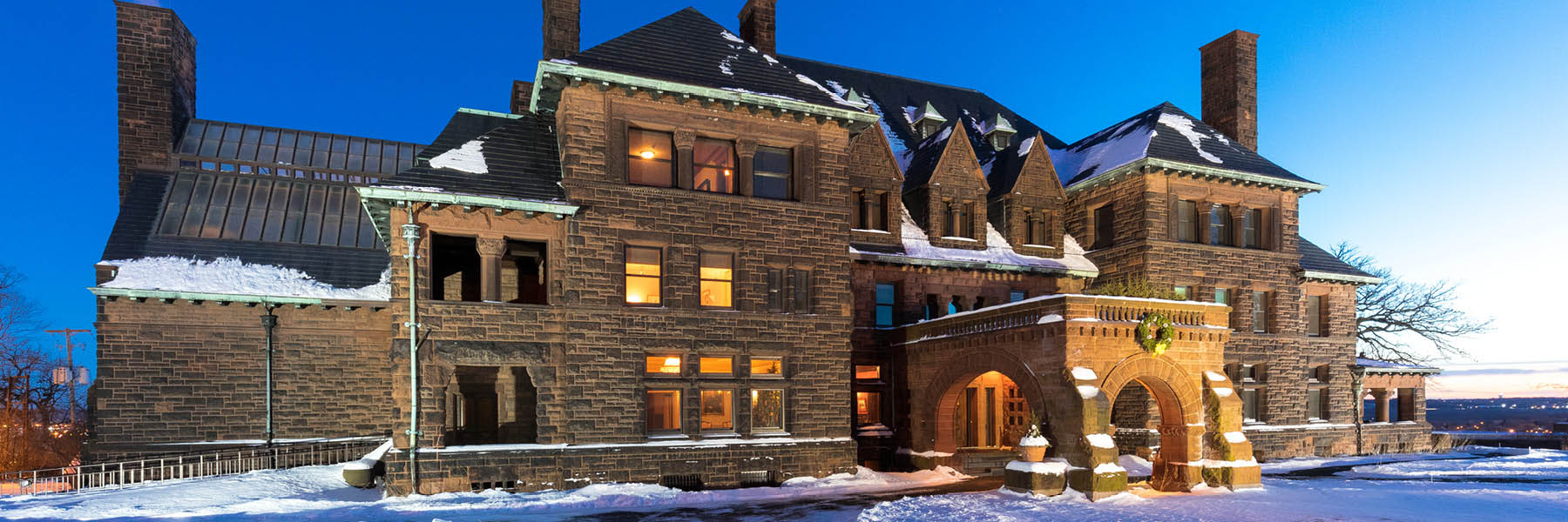 Exterior shot of Hill House in the winter.
