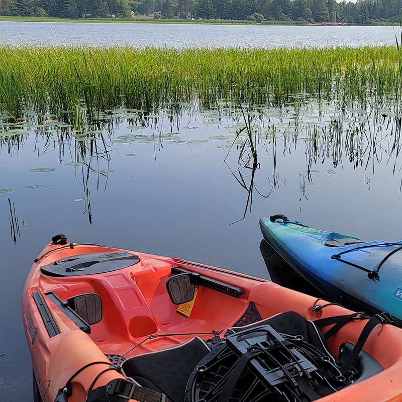 Kayaks on a lake.