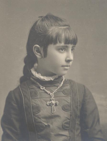 Portrait of young Mamie, facing right