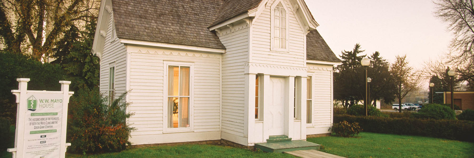 Exterior of white wood house.