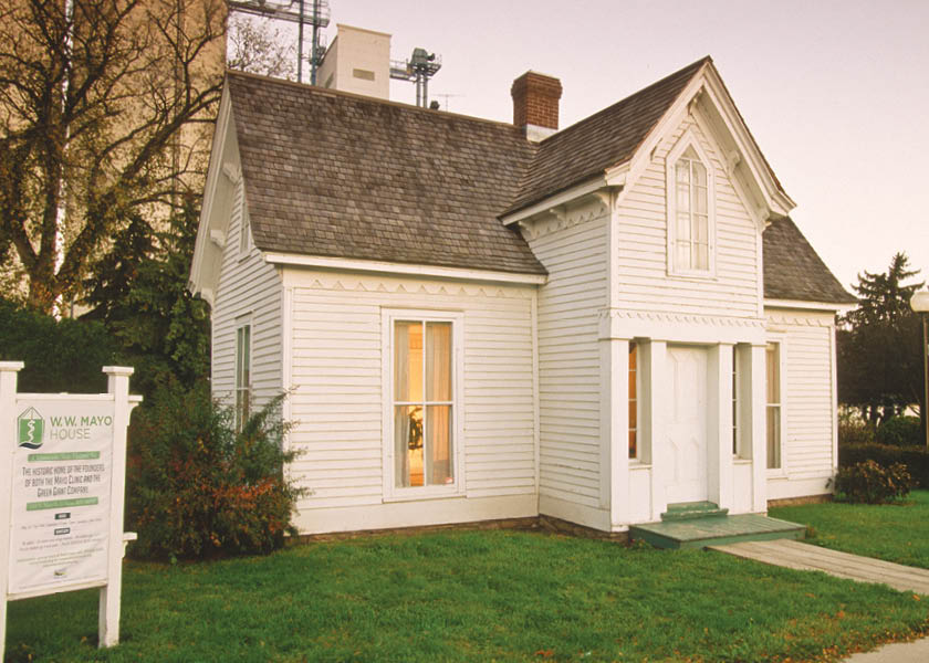 Exterior of white wood house.