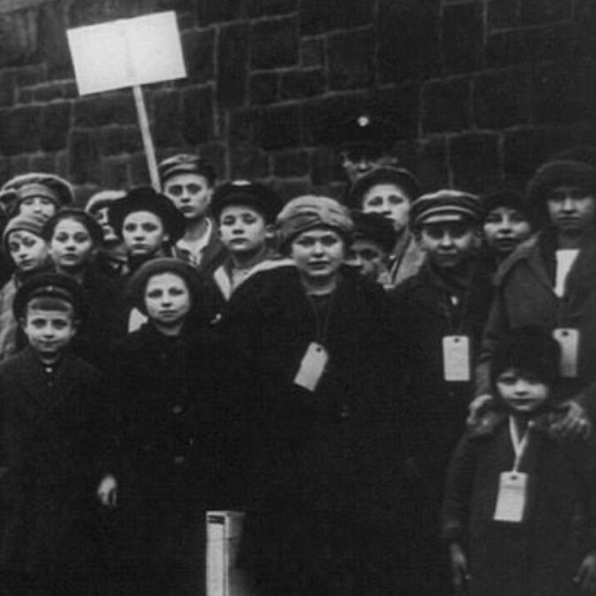 Black and white photo of children picketing