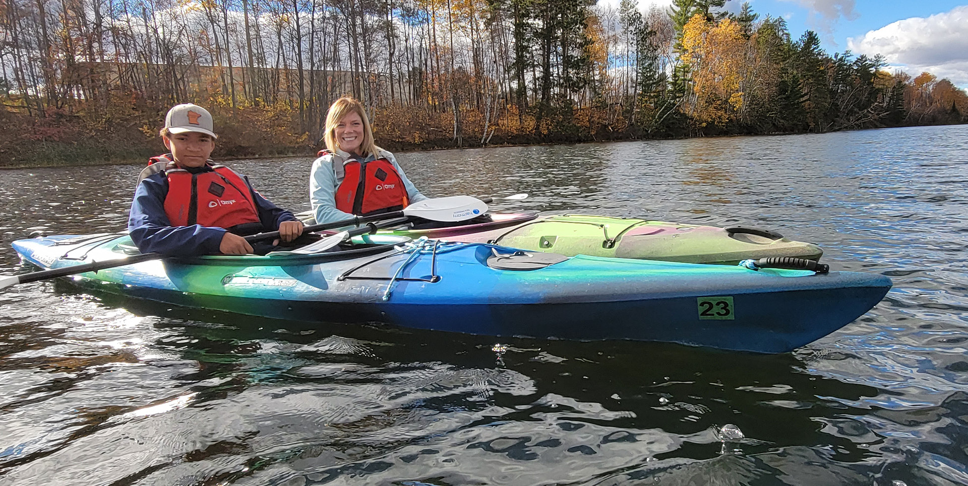 Two people kayaking.