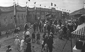 Visitors walking the circus grounds.
