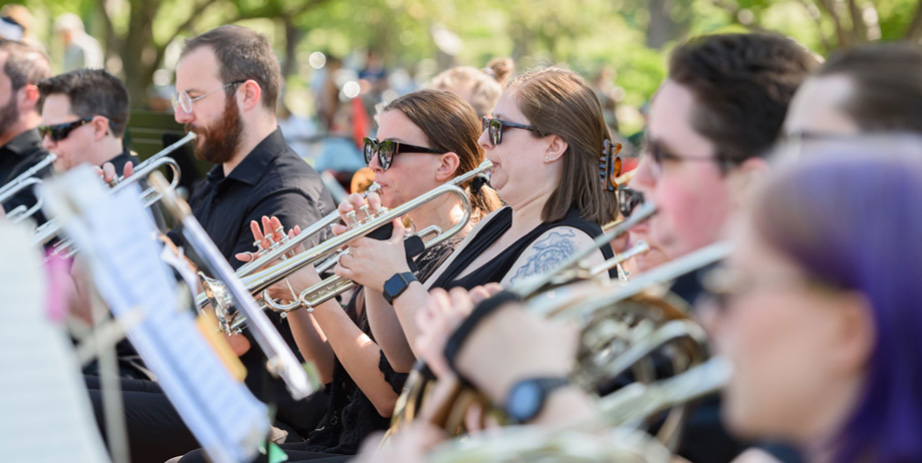 people playing brass instruments