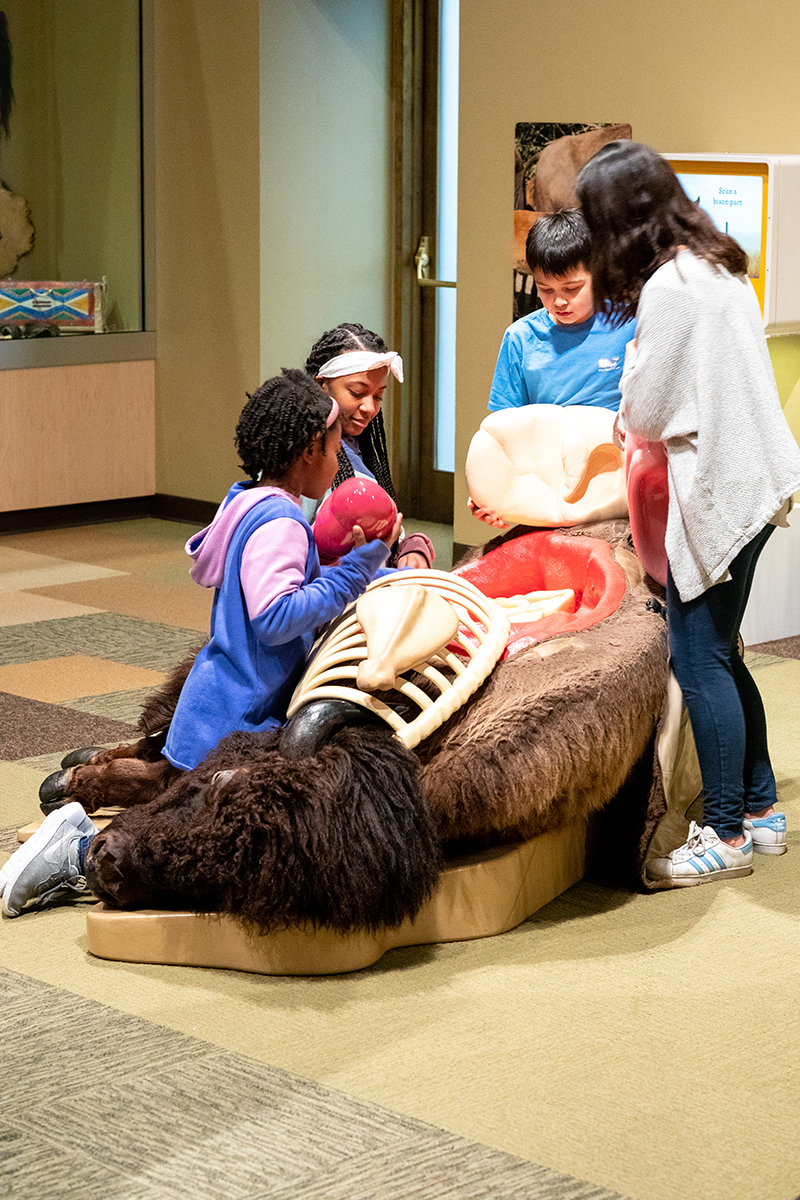 Kids in the "Then Now Wow" exhibit.