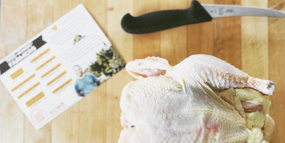 Image of preparing a chicken for cooking