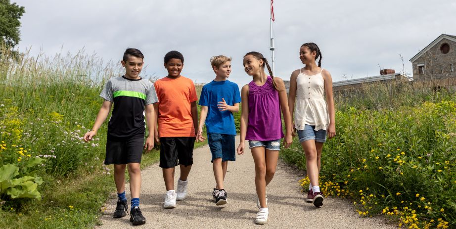 5 children walk a path at Historic Fort Snelling