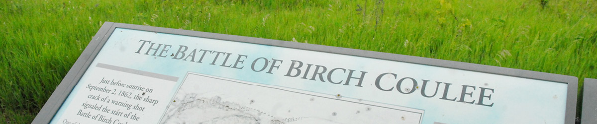 A sign titled "The Battle of Birch Coulee".