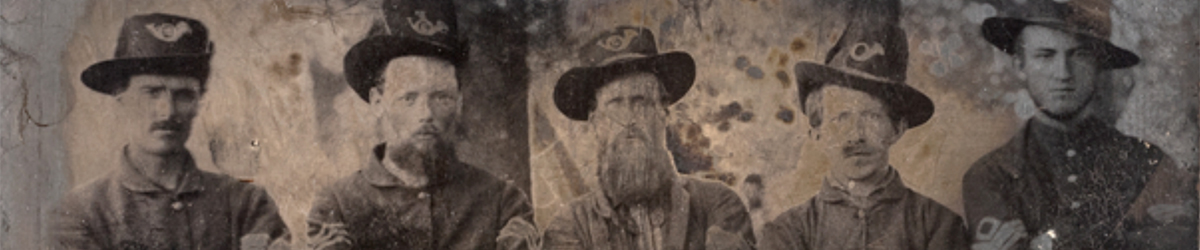 Historic image of men wearing hats.
