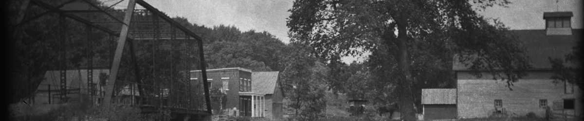 Historic photo of the structures and bridge in Forestville.