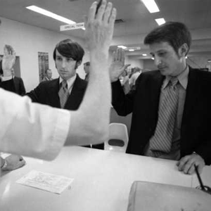 Black and white photograph of Jack Baker and James Michael McConnell applying for a marriage license in Minneapolis, 1970.