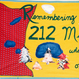 Color image of a quilt panel memorializing 212 Minnesotans who had died of AIDS, 1988.