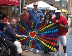 A group at Rochester Pride. Photograph by Randy Stern, July 22, 2012.