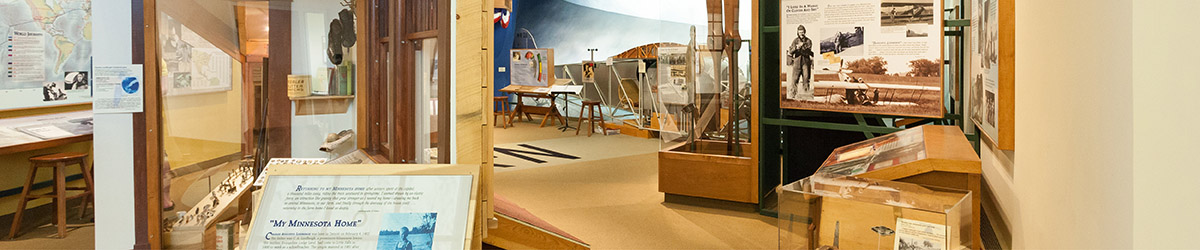 Exhibits on Charles Lindbergh and a view of the flight simulator.