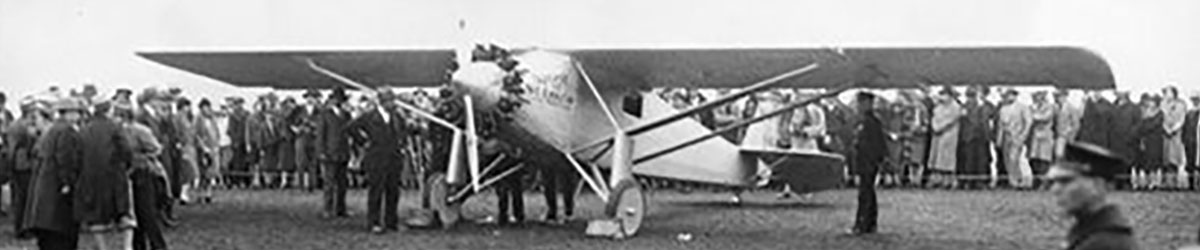 People surrounding an airplane.