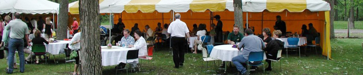 People gathering at an outdoor event.