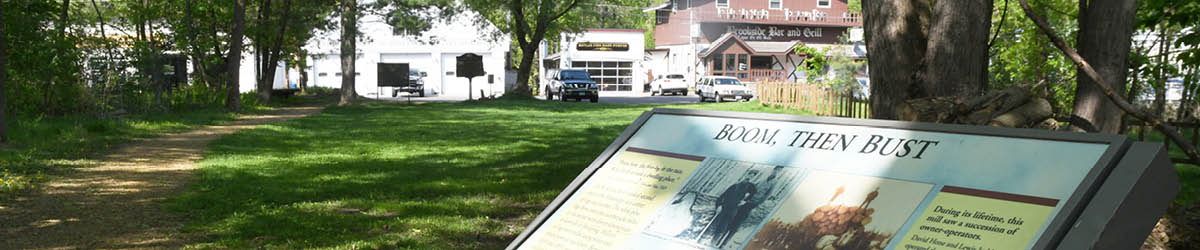 Top half of a Marine Mill Park interpretive sign with the title "Boom, Then Bust."