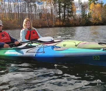 Two people kayaking.