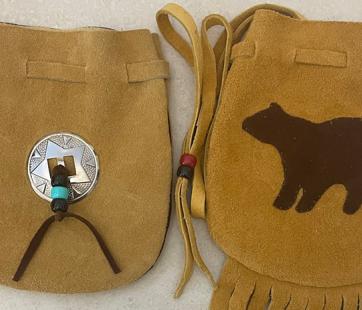 Leather pouch.