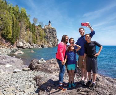 Family in front of Split Rock Lighthouse.