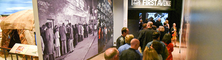 A line of people waiting to get into the First Avenue exhibit.
